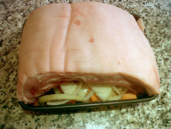 raw belly pork squeexed into a pan