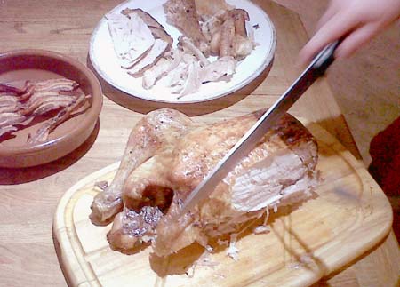 roast chicken being carved